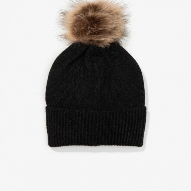 Gorro amb borla.