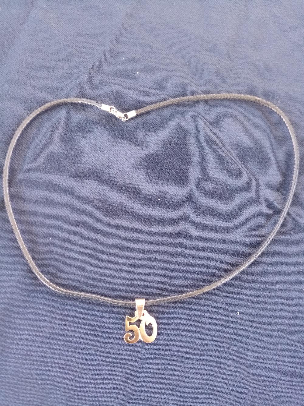 Colgante 50 oro 18k. Hecho artesanalmente